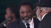 Mokonzi ya kala ya RDC Joseph Kabila azali kosolola na mokonzi ya kala ya Namibie Sam Nujoma na matanga ya mokonzi ya kala ya Zibambwe Robert Mugabe, na Harare, 14 septembre 2019.