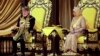 The 17th king of Malaysia, Sultan Ibrahim Iskandar, lifts a ceremonial dagger as Queen Raja Zarith Sofiah looks on during his coronation at the National Palace in Kuala Lumpur, Malaysia, on July 20, 2024. 