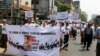 ဖွဲ့စည်းပုံအခြေခံပြင်ရေး ဆန္ဒပြကြစဉ်။
