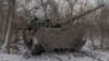 Український танкіст 68-ї бригади на танку Leopard 1A5 поблизу Покровська, Донеччина, 13 грудня 2024 р. Roman PILIPEY/AFP