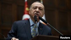 FILE - Turkish President Tayyip Erdogan addresses members of parliament in Ankara, Turkey, January 15, 2019. 