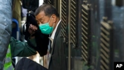 FILE - Democracy advocate Jimmy Lai arrives at Hong Kong's Court of Final Appeal in Hong Kong Feb. 1, 2021.