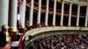 FILE - Visitors, top, and parliament members attend the questions to the government session at the National Assembly in Paris, Dec.4, 2018. 