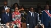 François Bey (Likolo mpe na D) a na tala ya moyindo, mopesi toli na mambi ya bokengi ya président Félix Tshisekedi, mokolo ya bolapi ndayi ya bokoti na bokonzi ya Félix Tshisekedi pene na Joseph Kabila mokonzi ya kala, Kinsha24 janvier 2019sa, 