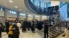 People arrive at Parliament in Wellington, New Zealand, on July 24, 2024, for the final report of a wide-ranging independent inquiry into the abuse of children and vulnerable adults over the span of five decades.