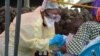 Mwana moko apesami mangwele ya Ebola na Goma, Nord-Kivu, 7 aout 2019.