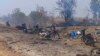 This photo provided by the Kyunhla Activists Group shows aftermath of an airstrike in Pazigyi village in Sagaing Region's Kanbalu Township, Myanmar, April 11, 2023. 