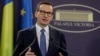 Perdana Menteri Polandia Mateusz Morawiecki menghadiri konferensi pers di kantor pusat pemerintah Rumania selama kunjungan resmi di Bukares, Rumania, 28 Maret 2023. (Foto Inquam/Octav Ganea via REUTERS)