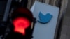 FILE - A view of the Twitter logo at its corporate headquarters in San Francisco, California, Nov. 18, 2022.