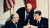 FILE - U.S. President Ronald Reagan (R) and Soviet leader Mikhail Gorbachev exchange pens during the Intermediate Range Nuclear Forces Treaty signing ceremony in the White House East Room in Washington, D.C., Dec. 8, 1987. 