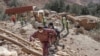 Petugas penyelamat melanjutkan operasi penyelamatan di daerah pegunungan Tizi N'Test, di provinsi Taroudant, salah satu daerah paling parah di Maroko yang dilanda gempa, Senin 11 September 2023.