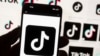 The TikTok logo is seen on a cellphone on in Boston, Oct. 14, 2022.