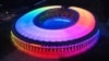 FILE - The illuminated Olympic Stadium is pictured in Berlin on June 23, 2021. Scars of World War II and relics from its Nazi past are preserved at Berlin's Olympiastadion.