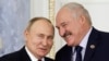 FILE - Russian President Vladimir Putin and Belarusian President Alexander Lukashenko shake hands during a meeting in St. Petersburg, Russia, on Jan. 29, 2024. Lukashenko has depended on Russian support throughout his 30-year rule.