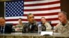 FILE - President Barack Obama (C) sits for a military briefing at Bagram Air Base in Kabul, Afghanistan, May 25, 2014.