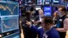 Wall Street soars to record highs in rally that sweeps world 