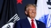 Mantan Presiden AS dan calon presiden dari Partai Republik Donald Trump tersenyum saat kampanye di Windham, New Hampshire, AS, 8 Agustus 2023. (REUTERS/Reba Saldanha)